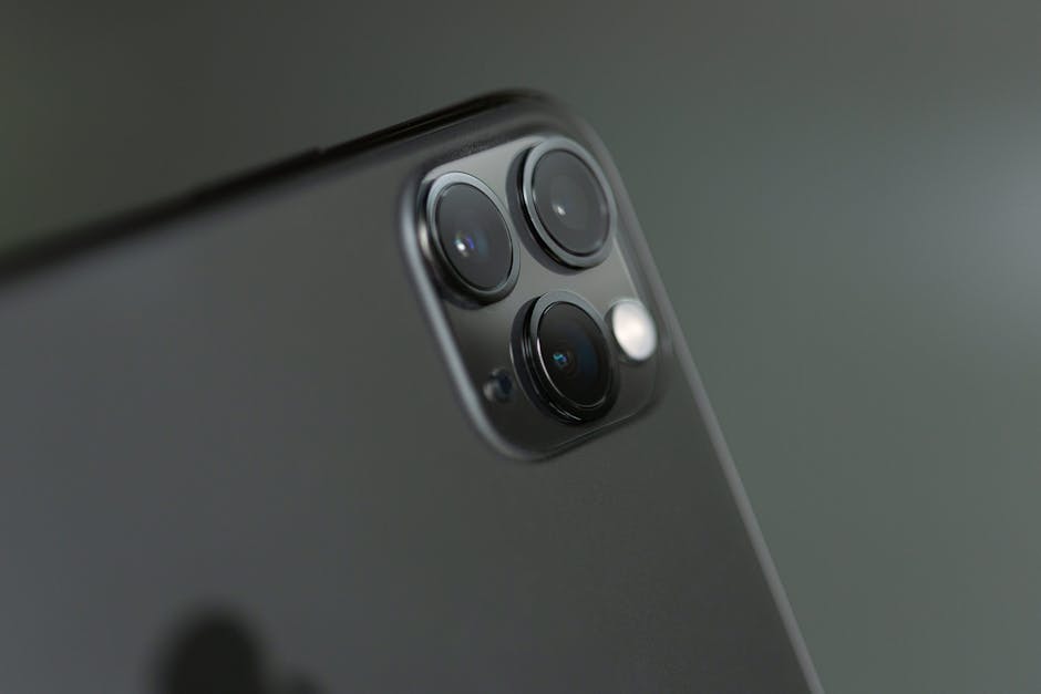 The iPhone 15 Pro Max smartphone displaying its elegant titanium design and advanced camera capabilities.